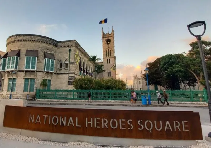 Historic downtown area in Barbados with a sign that says "National Hero's Square"
